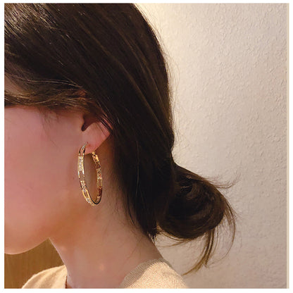 Personalized diamond earrings - Shuntia Symonette