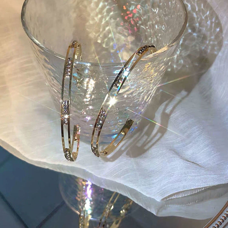 Personalized diamond earrings - Shuntia Symonette