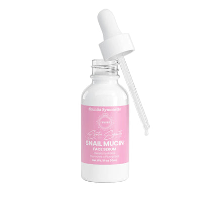 snail mucin face serum with hyaluronic acid collagen centella asiatica for hydration smoothing skin texture plumping glowing skin serum by Shuntia Symonette